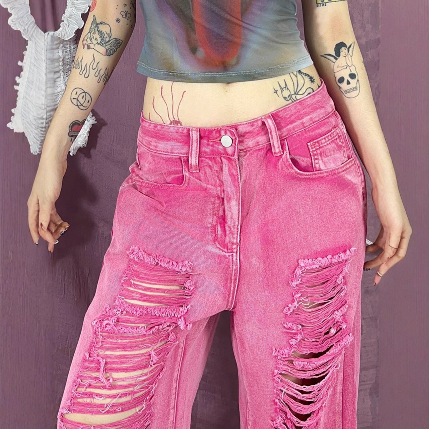Perforated and hollowed out low waisted jeans