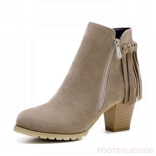 Beige ankle boot with fringe detail  
