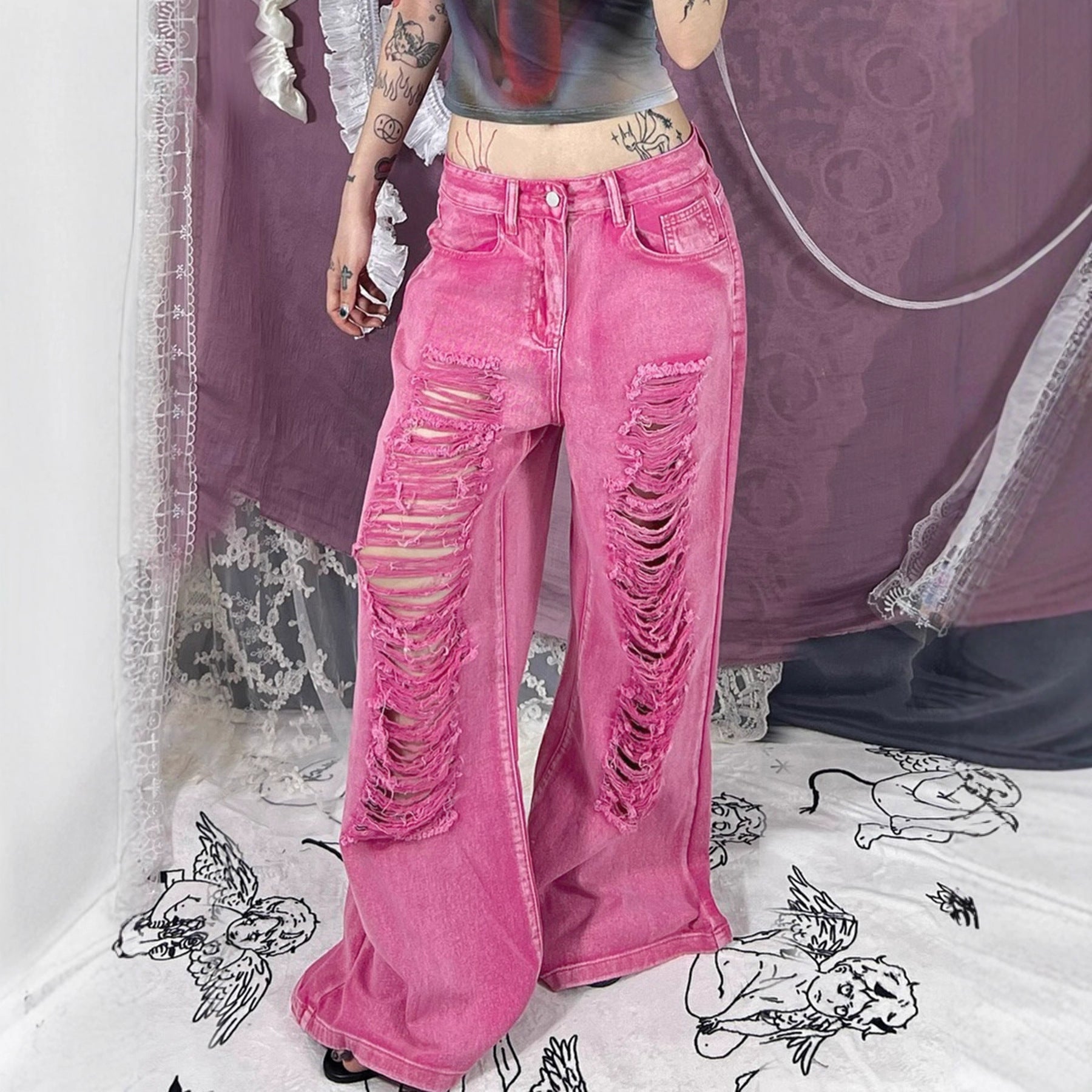 Perforated and hollowed out low waisted jeans