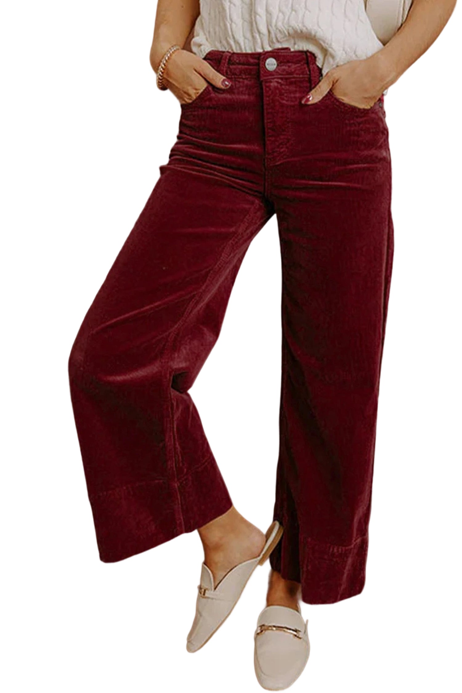 Maroon velvet wide-leg pants worn by a person on a white background