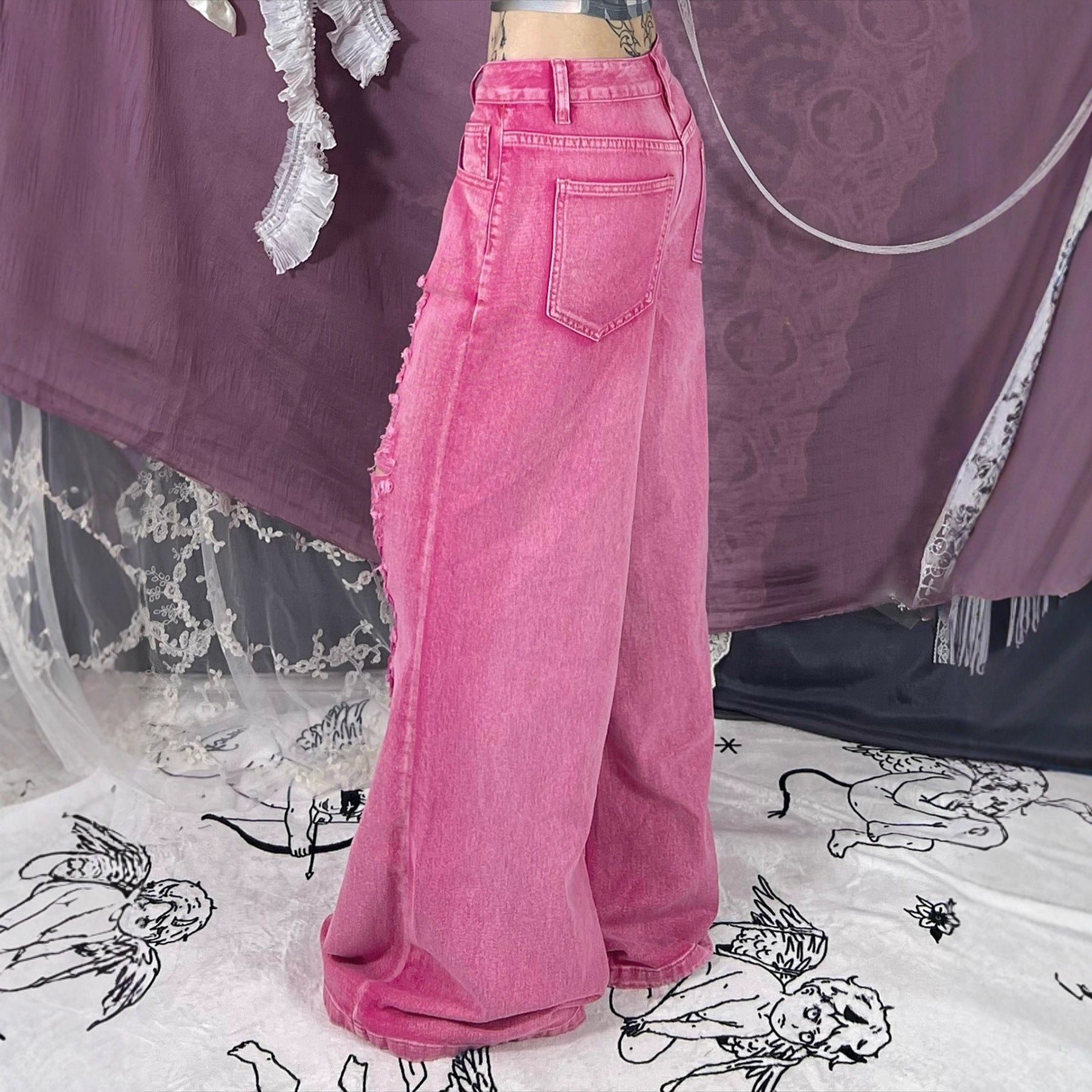 Perforated and hollowed out low waisted jeans