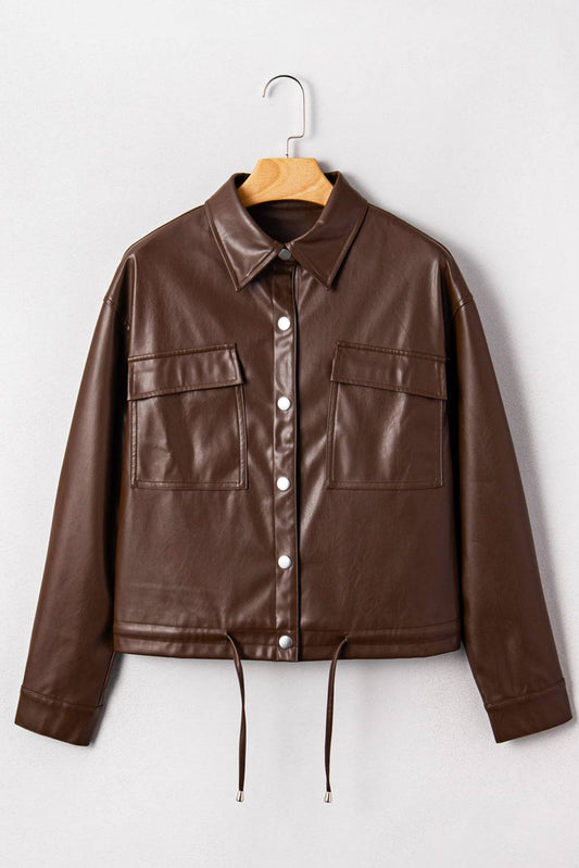 Brown leather jacket on a hanger against a white background