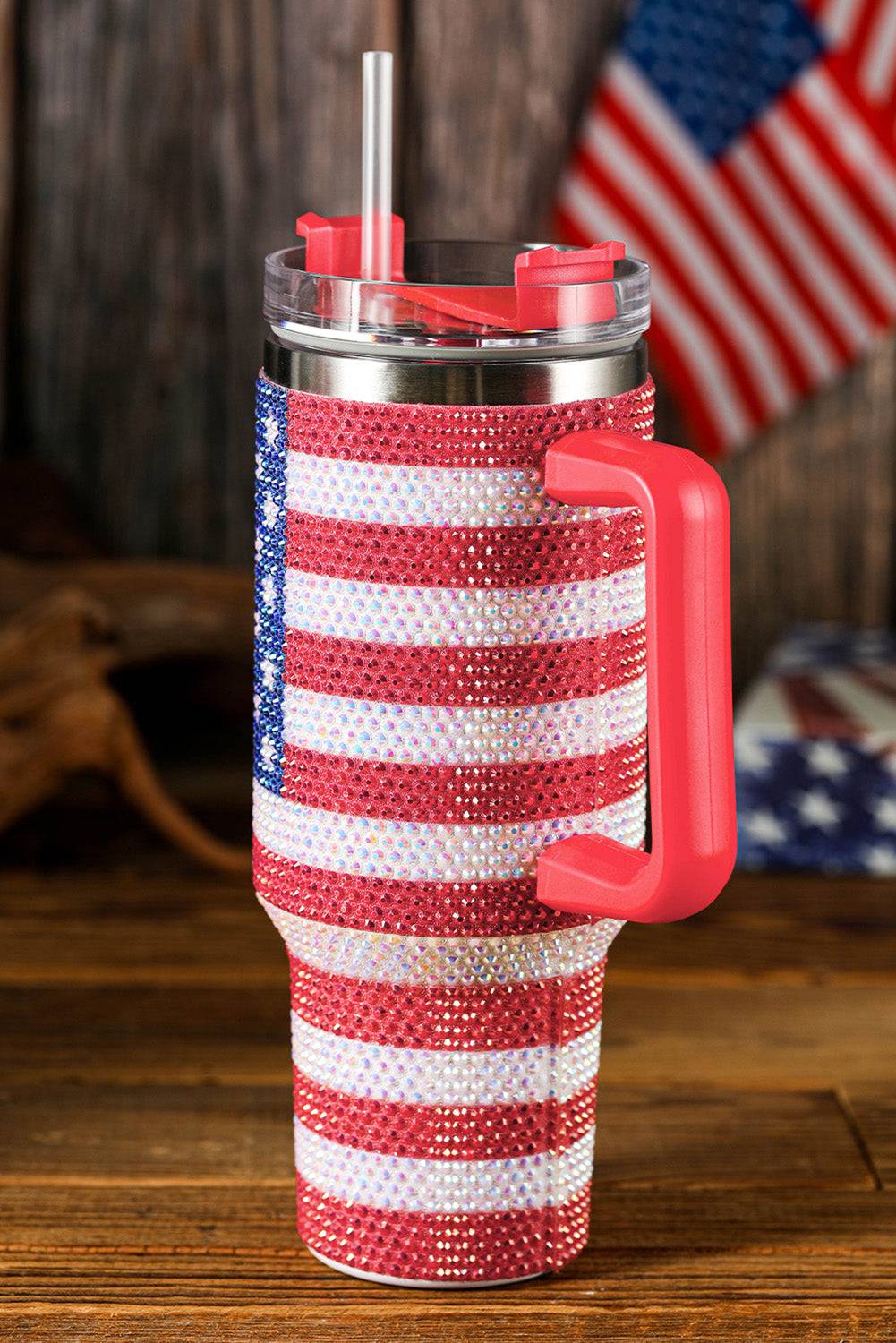 Tumbler with American flag design on a wooden surface