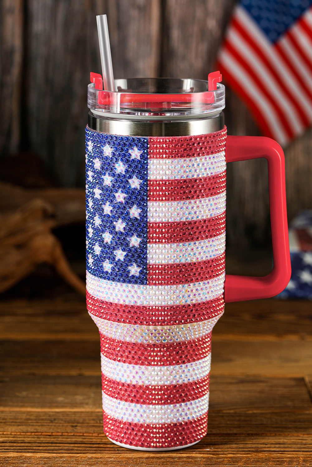 Tumbler with American flag design on a wooden surface