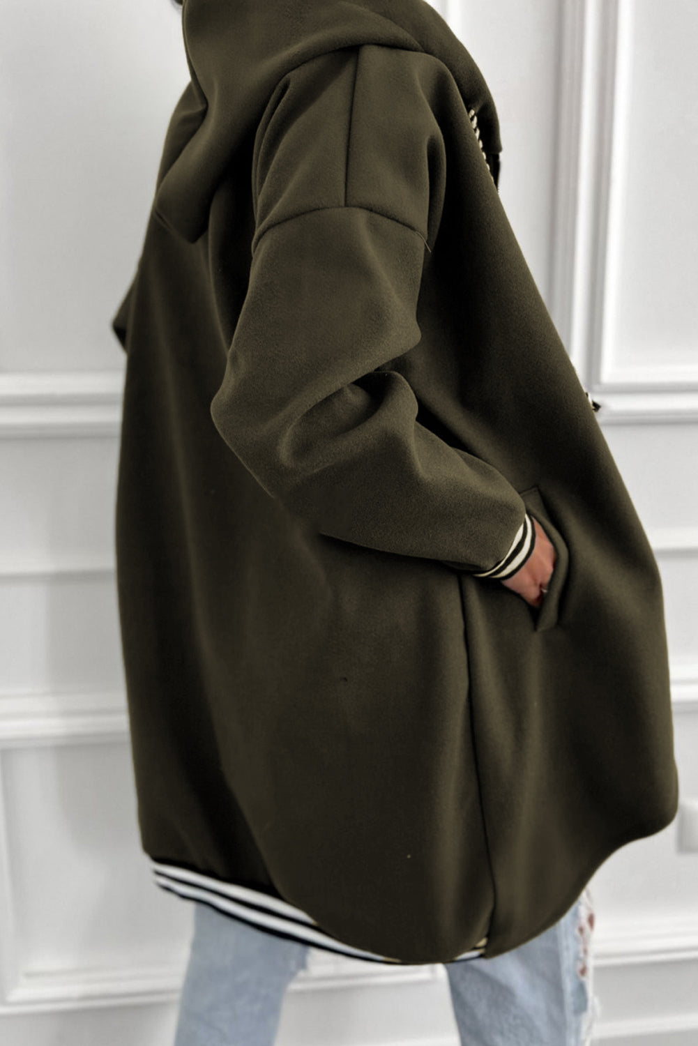 Green hoodie with white trim on a white background